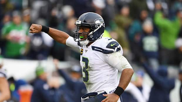 Seattle Seahawks quarterback Russell Wilson (3) reacts after a 58 yard touchdown run in the fourth quarter at Lincoln Financial Field.